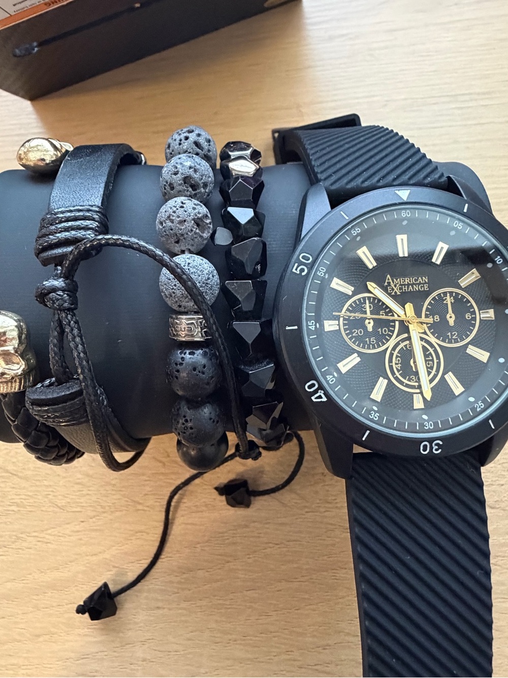 American Exchange Black and Gold Chronograph Watch with Bracelet Stack